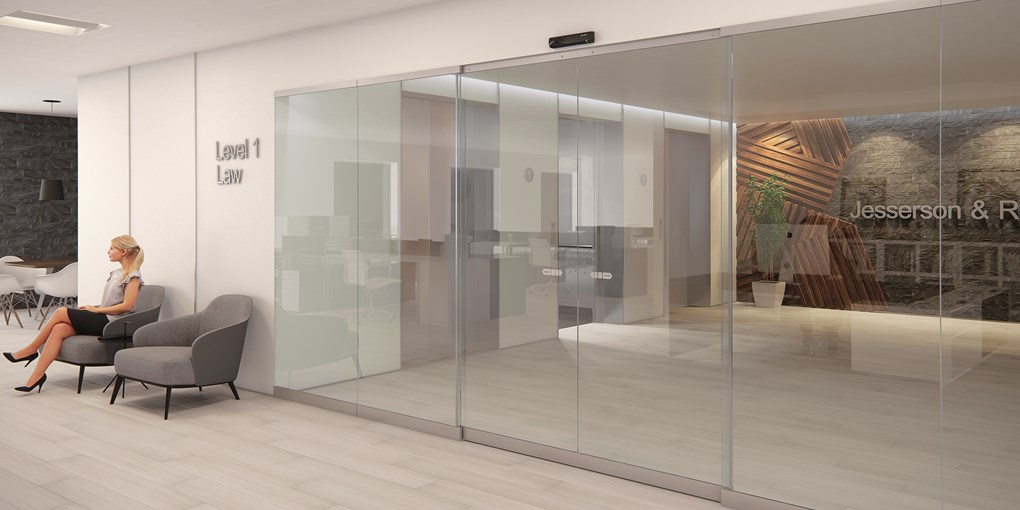 <p>ASSA ABLOY SL500 All-glass sliding door system with semi-transparent option for interior environments.</p>