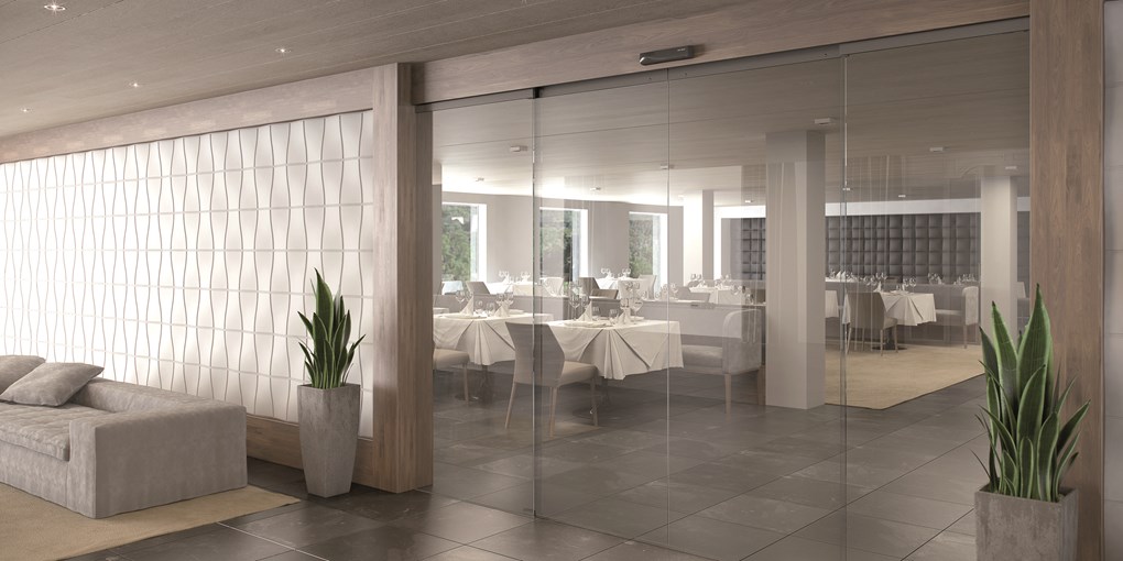 <p>ASSA ABLOY SL500 All-glass sliding door system with transparent option in hospitality.</p>